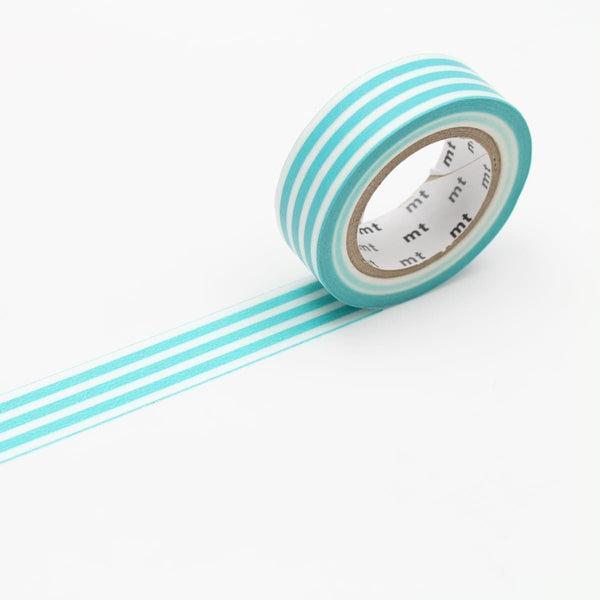Rulle med utrullad washi tape i serien Deco border. - Randig turkos dekorationstejp. - Tidformera