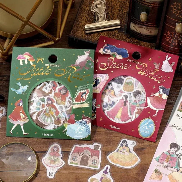 Serier - Flake stickers Fairy Tale från BGM. Förpackningar med klistermärken där några stickers ligger utströsslade på ett bord. Tidformera
