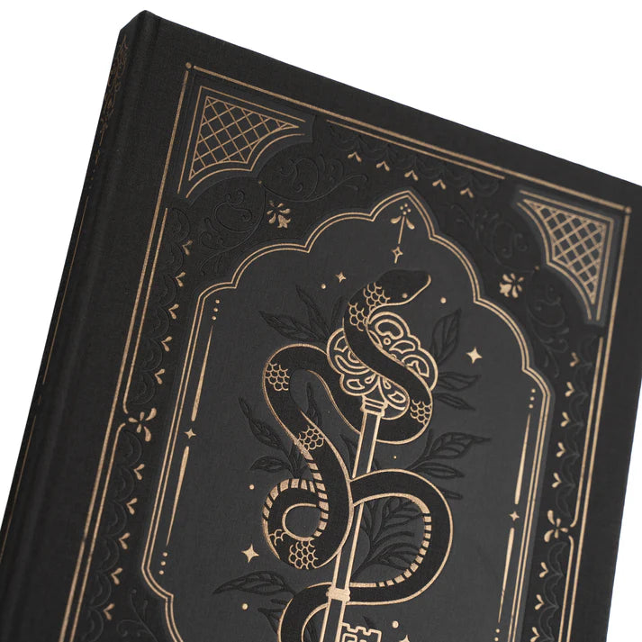 Detaljbild på pärmen av Coiled Key dotted notebook från Archer & Olive. Tidformera