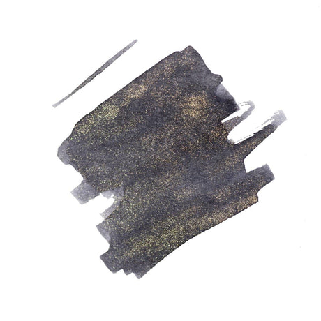 Färgprov på mörkgrå bläck som har guldskimmer. Bläckflaska J. HERBIN INK 50 ml Flacon 1670 Storm Grey/ Gris Orage från Herbin