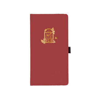 Röd prickad anteckningsbok med guldfärgat motiv - ett fönster med böcker och växt. Dotted Notebook Limited Edition Style Fall 2024 Slim - från Archer & Olive - Tidformera