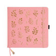 Rosa kvadratisk anteckningsbok med guldfärgat naturmotiv - Dotted Notebook Vernal Sunset SQ från Archer & Olive - Tidformera