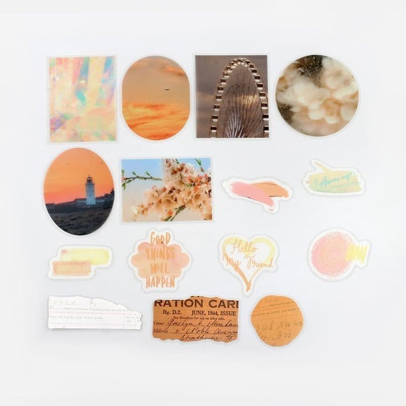 Flake stickers Color poems - Yellow från BGM. Klistermärken ligger utspridda med motiv  med pariserhjul, fyr, solnedgång och blommor. - Tidformera