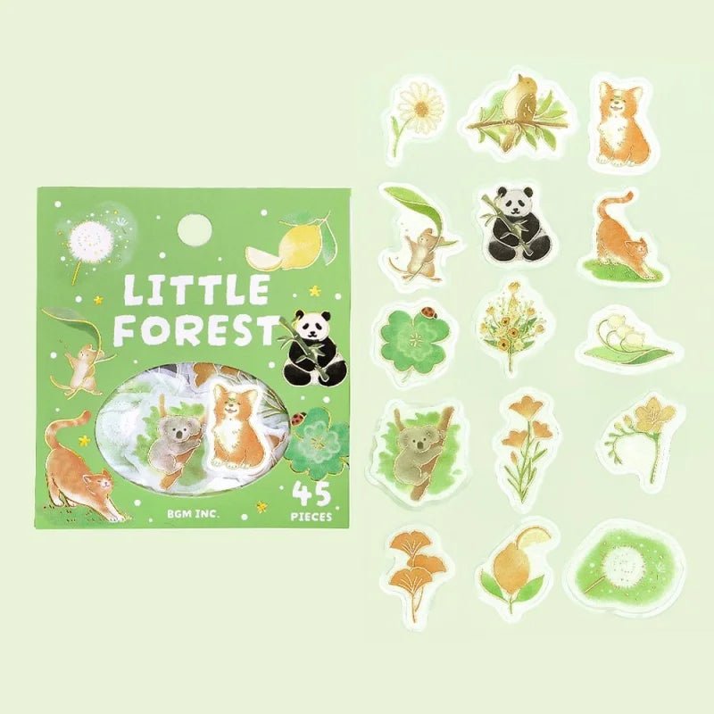 Förpackning med klistermärken. Stickers ligger utspridd. Koala, katt, panda, hund, fågel och växter. Flake stickers Little Forest - Green från BGM - Tidformera