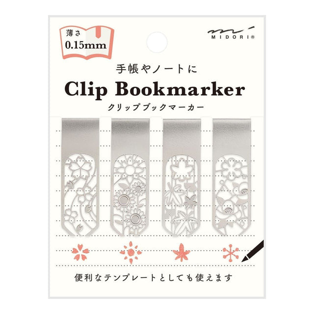 Förpackning med fyra bokmärken med olika motiv med blommor. Clip Bookmarker - Flower från Midori.