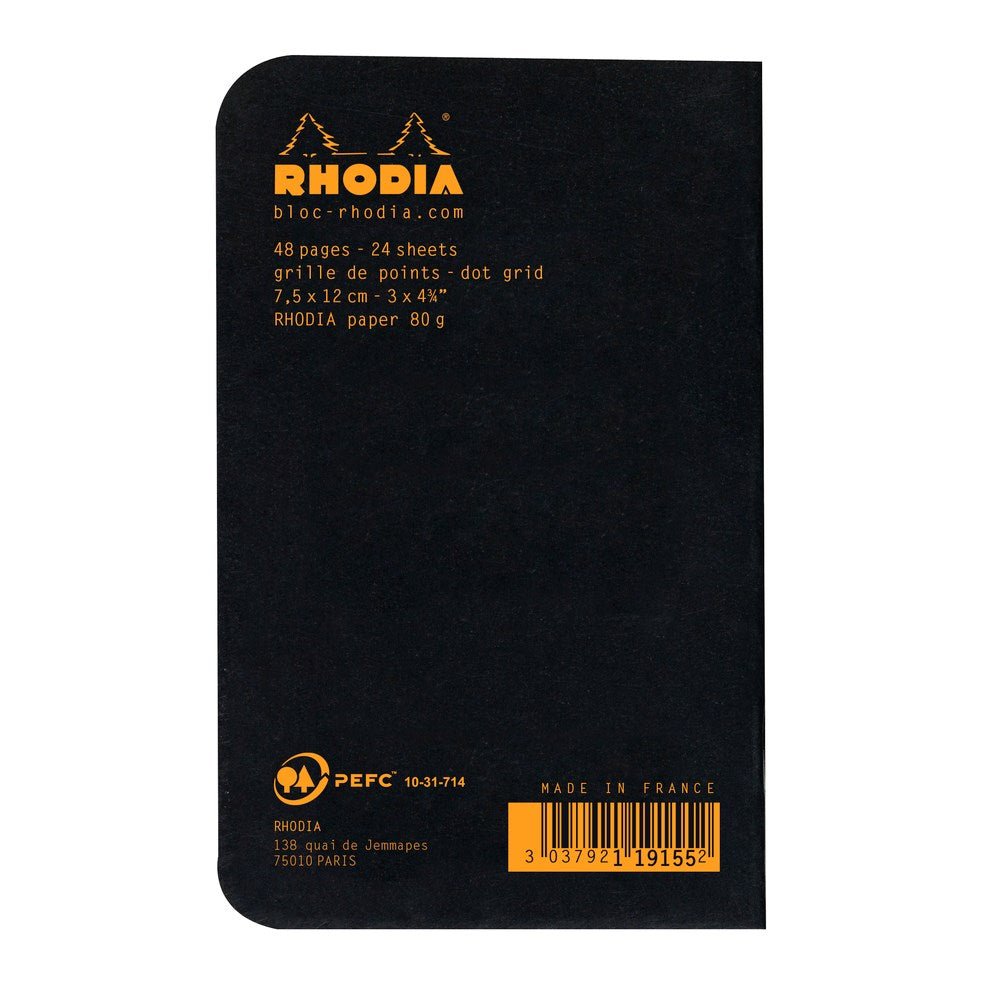 Rhodia Skrivhäften - A7 Dotted från Rhodia - Baksidan på ett skrivhäfte och där står Rhodia 48 pages 24 sheets dot grid Pefc Made in France. Tidformera