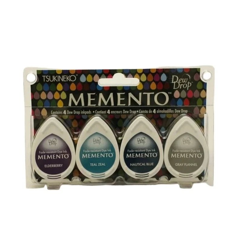 Stämpeldyna Memento Dew Drop - Dolphin Play från Tsukineko.  Förpackning med fyra stämpeldynor i färger.na lila, blå och grå.  - Tidformera