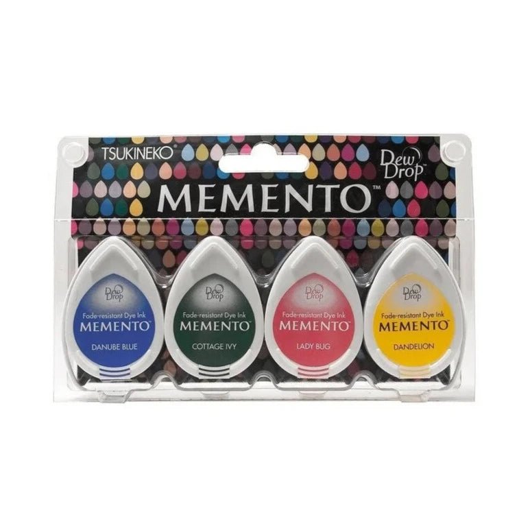 Stämpeldyna Memento Dew Drop - Prime Time från Tsukineko. En förpackning med fyra stämpeldynor som har färgerna Danube Blue, Cottage Ivy, Lady Bug och Dandelion. - Tidformera