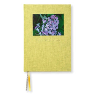 Trädgårdsdagbok från Paperstyle - Gul anteckningsbok med syrenblommor på en bild - Tidformera