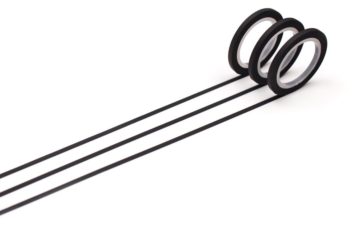 Washi Tape Slim 3 mm 3-pack - Black från MT masking tape. Tre stycken svarta utrullade dekorationstejpar. - Tidformera