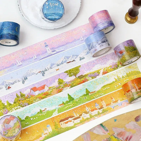 Flera rullar washi tape i serien Dot drawing från BGM ligger utrullade. Vackra landskapsmotiv. - Tidformera
