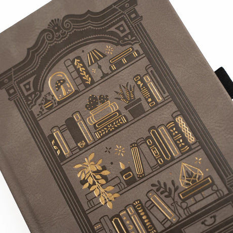 Detaljbild på otivet på Bookshelf Dotted notebook från Archer & Olive. Tidformera