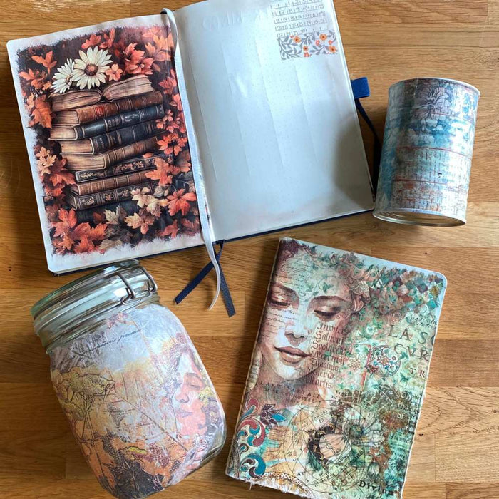 Decoupage med rice paper  i och på omslaget av anteckningsböcker och på två burkar. Tidformera