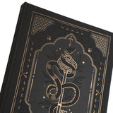 Detaljbild på pärmen av Coiled Key dotted notebook från Archer & Olive. Tidformera
