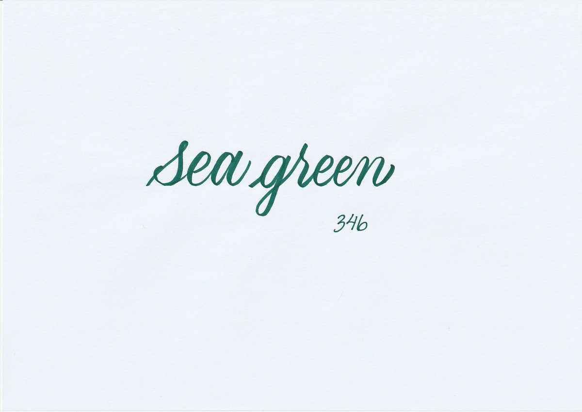 Handskriven text med orden "sea green" i havsgrön färg, skriven med ABT Dual Brush Pen i nyansen 346 Sea Green.