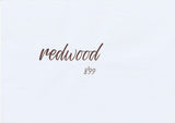Handskriven text med ordet "redwood" i brun färg, skriven med ABT Dual Brush Pen i nyansen 899 Redwood.