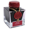 Bläckflaska J. HERBIN INK 50 ml - Flacon 1670 Rouge Hématite från Herbin. Fyrkantig glasflaska med rött bläck i. - Tidformera