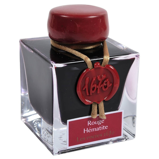 Bläckflaska J. HERBIN INK 50 ml - Flacon 1670 Rouge Hématite från Herbin. Fyrkantig glasflaska med rött bläck i. - Tidformera