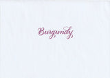 Handskriven text med ordet "Burgundy" i rödlila färg, skriven med Pentel Brush Sign Pen i färgen Burgundy.