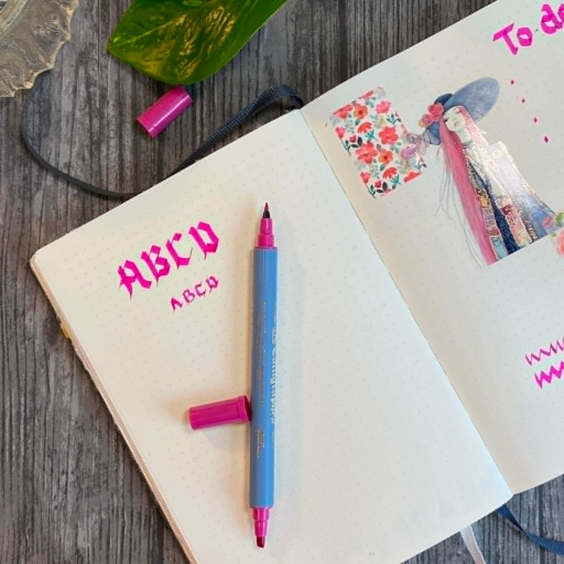 Zig Calligraphy II TC-3100 Dark pink har använts i en bullet journal hos Tidformera