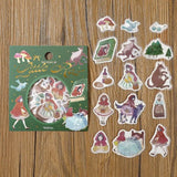 Flake stickers - Fairy Tale - Red Riding Hood från BGM. Förpackning som är full med klistermärken. Bredvid ligger stickers med motiv med rödluvan, vargen, mat, mormor, granar. - Tidformera