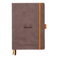 GoalBook Dotted notebook A5 - Chocolate från Rhodia - Brun anteckningsbok. Boken har 2 bokmärkesband samt en orange gummiband för stängning och pennhållare.
 - Tidformera