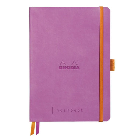 GoalBook Dotted notebook A5 - Lilac från Rhodia - Lila anteckningsbok. Boken har 2 bokmärkesband samt en orange gummiband för stängning. - Tidformera