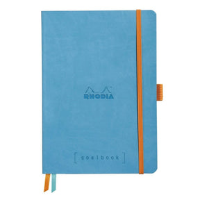 GoalBook Dotted notebook A5 - Turquoise blue från Rhodia - Turkos anteckningsbok. Boken har 2 bokmärkesband samt en orange gummiband för stängning. - Tidformera