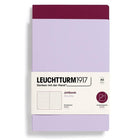 Ett vinrött och ett lila skrivhäfte - Jottbook Double Skrivhäften Dotted 2-pack A5 Lilac/Port red från Leuchtturm1917
