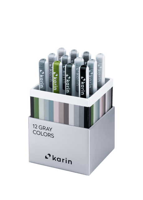 Realbrush PRO 12 - pack - Gray colors från Karin. Förpackning med 12 penselpennor i gråa nyanser. - Tidformera