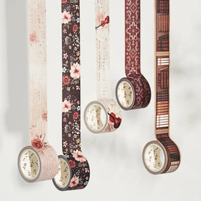 Washi tape Academia 5 - pack från Washi Tape Shop. 5 dekorationstejp som hänger utrullade.  Motiven är blommigt, musik och böcker. - Tidformera