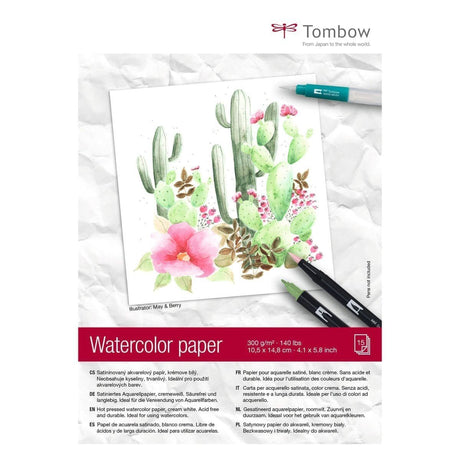 Watercolor paper Akvarellblock - A6 - från Tombow. Ett block som det står Watercolor paper på. På framsidan syns kaktusar och blommor som målats. pennor och pensel ligger på målningen.  - Tidformera